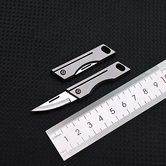 Titanium Alloy Mini Folding Knife High Hardness D2 Steel Sharp Knife With Keychain Pendant Disassembly Express Open Box EDC Tool